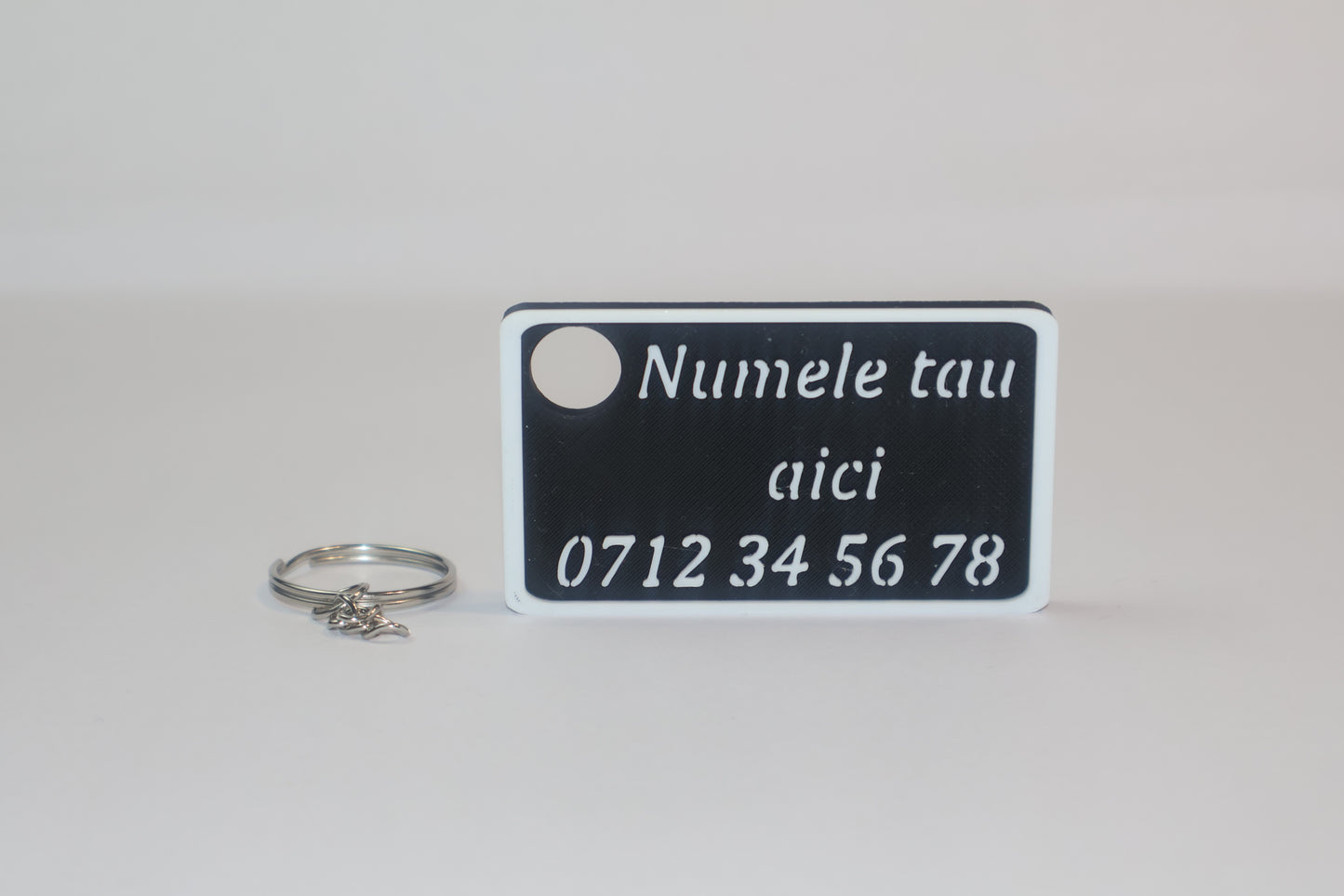 Breloc personalizat cu nume, număr de telefon sau firmă